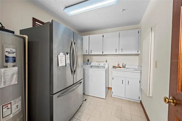 a view of a hallway with a chandelier
