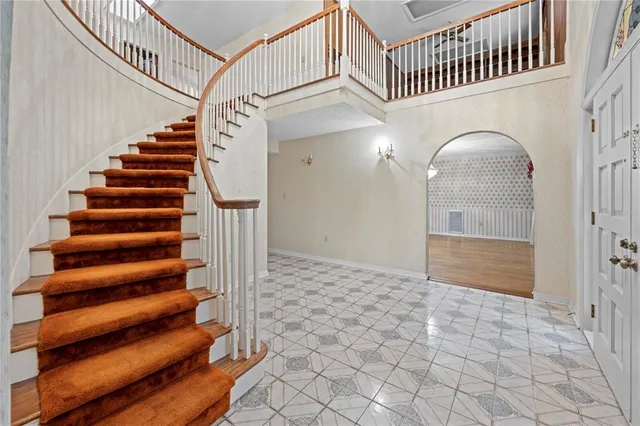 a view of entryway with a front door