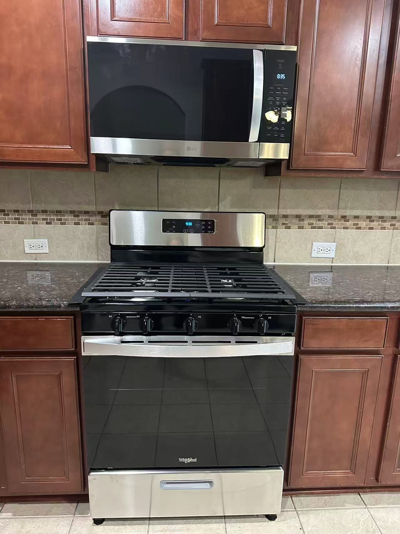 26315 Fox Ridge Lane Katy, TX 77494 - Photo 10 of 39 a kitchen with granite countertop cabinets and stainless steel appliances