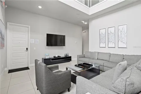 a bedroom with a bed and a mirror