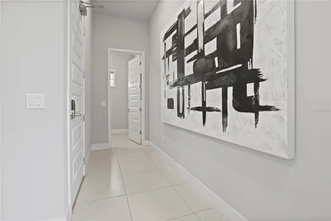 a bathroom with double sink and a mirror