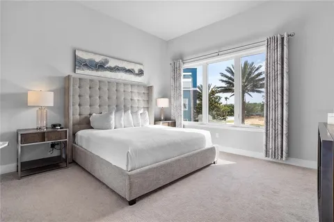 a bathroom with a tub shower and sink