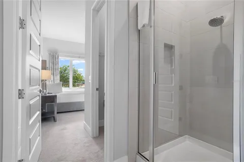 a bedroom with a bed and a table