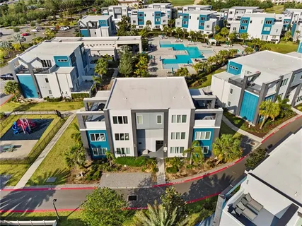 an aerial view of a house with a garden