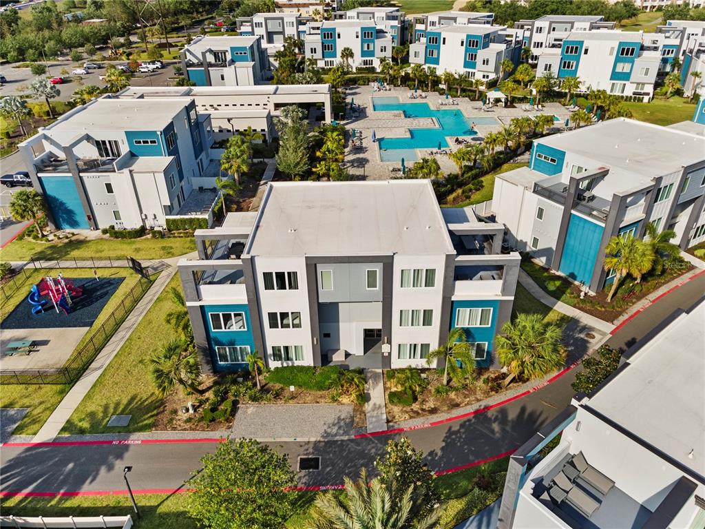 7770 Sandy Ridge Drive, Unit 207 Reunion, FL 34747 - Photo 3 of 61 an aerial view of a house with a garden