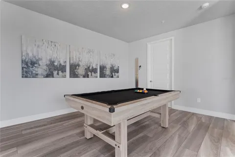 a bathroom with a toilet sink and shower