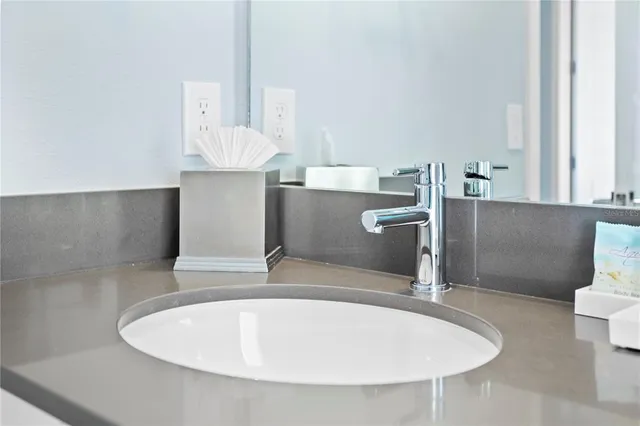 a table and chairs in front of a house