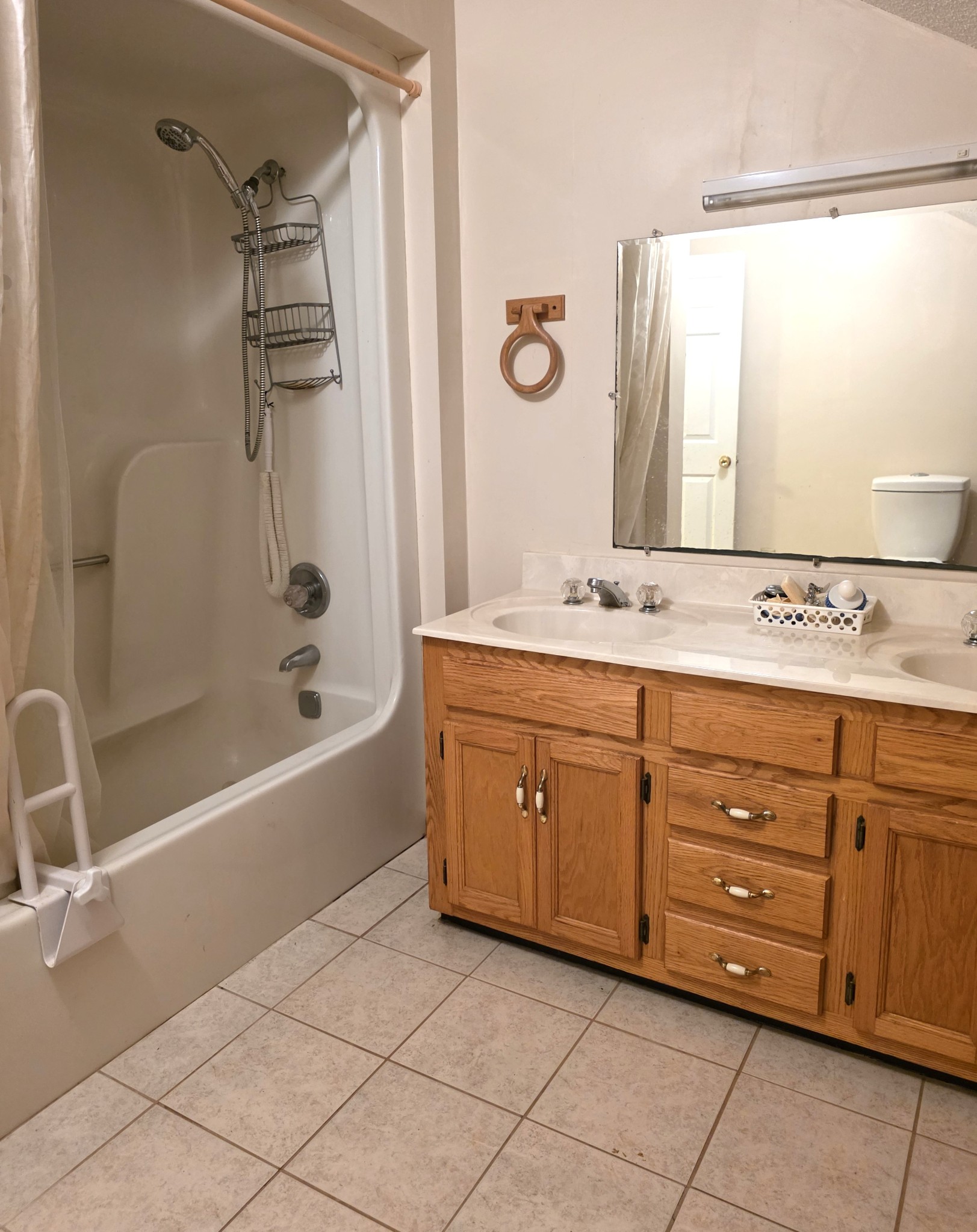 1117 Essie Cleek Road Tullahoma, TN 37388 - Photo 28 of 29 a spacious bathroom with a granite countertop sink mirror and a bathtub