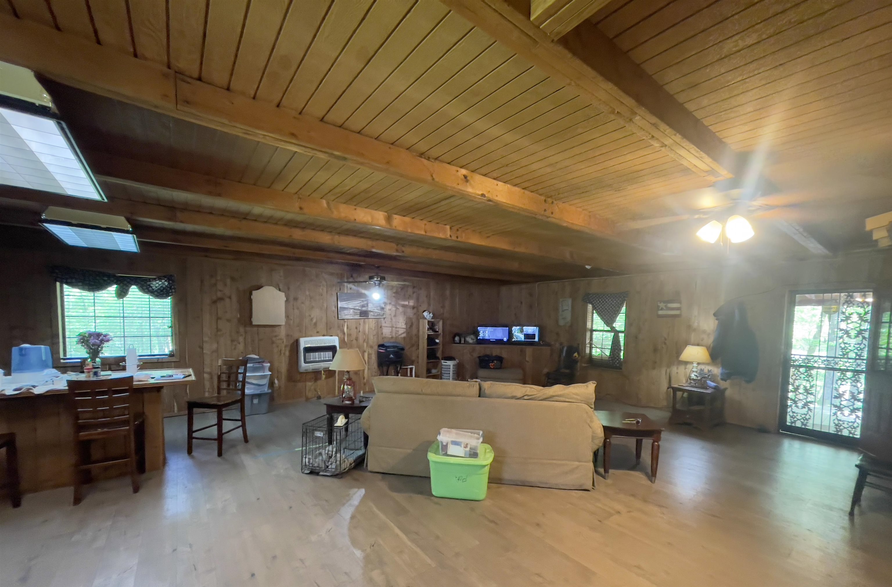 3493 Riverside Drive Jackson, TN 38301 - Photo 8 of 28 a living room with patio furniture and a wooden floor