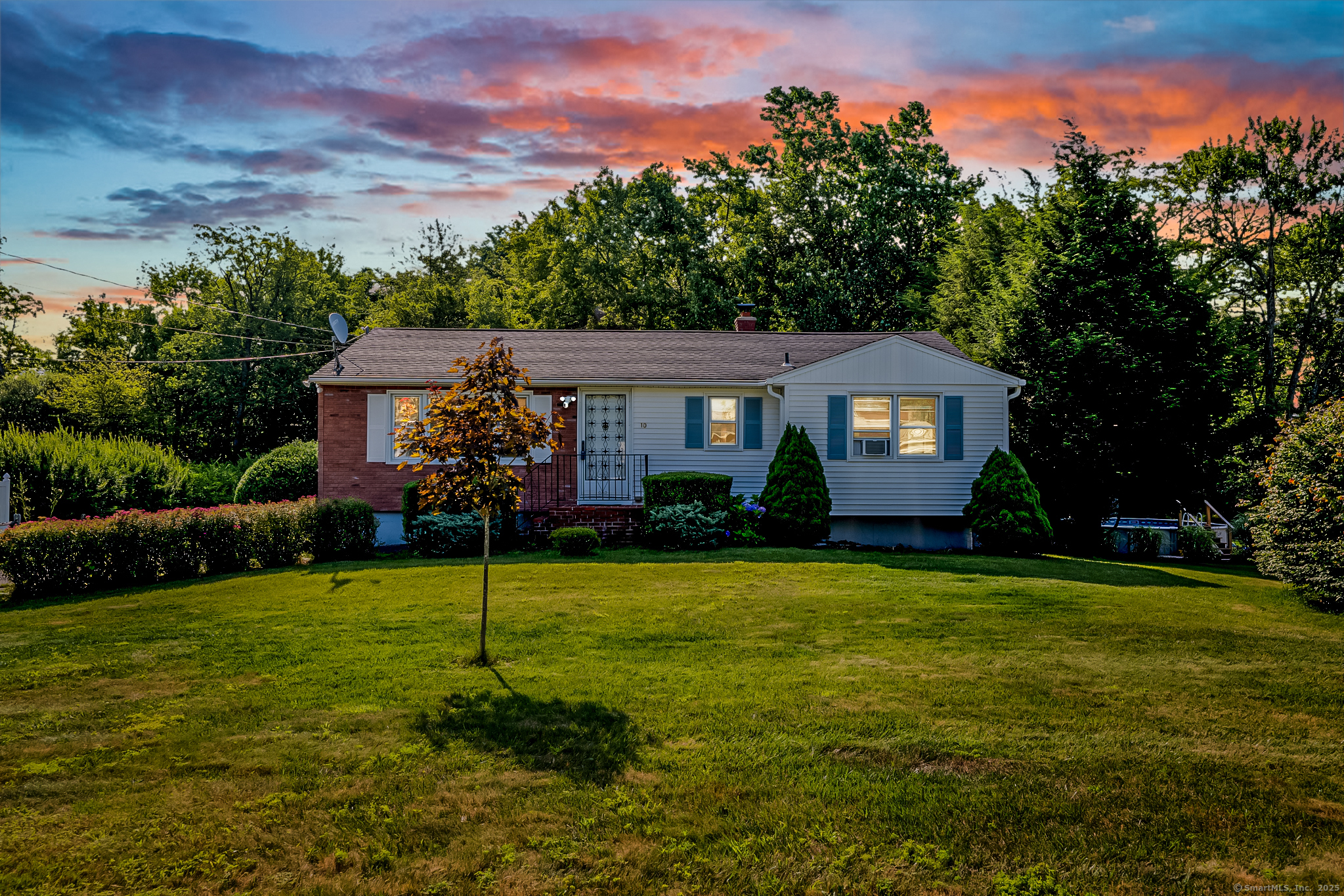 a house view with a garden space