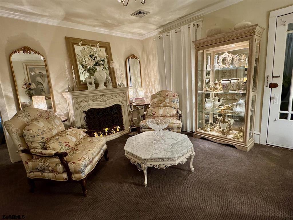 1050 Shore Road Linwood, NJ 08221 - Photo 3 of 6 a living room with furniture and a fireplace