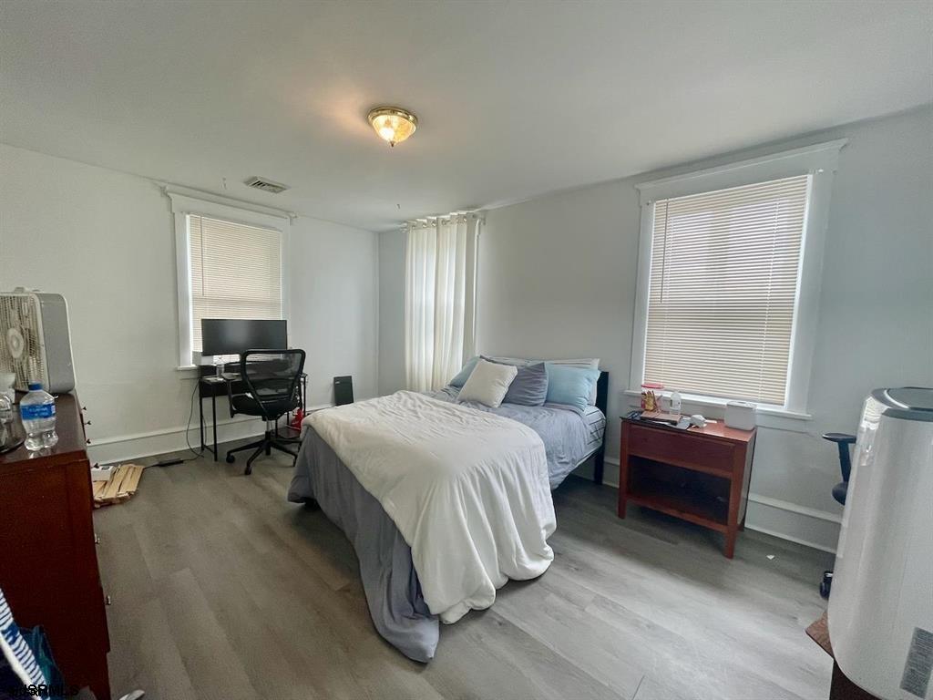1050 Shore Road Linwood, NJ 08221 - Photo 6 of 6 a bedroom with a bed and a window