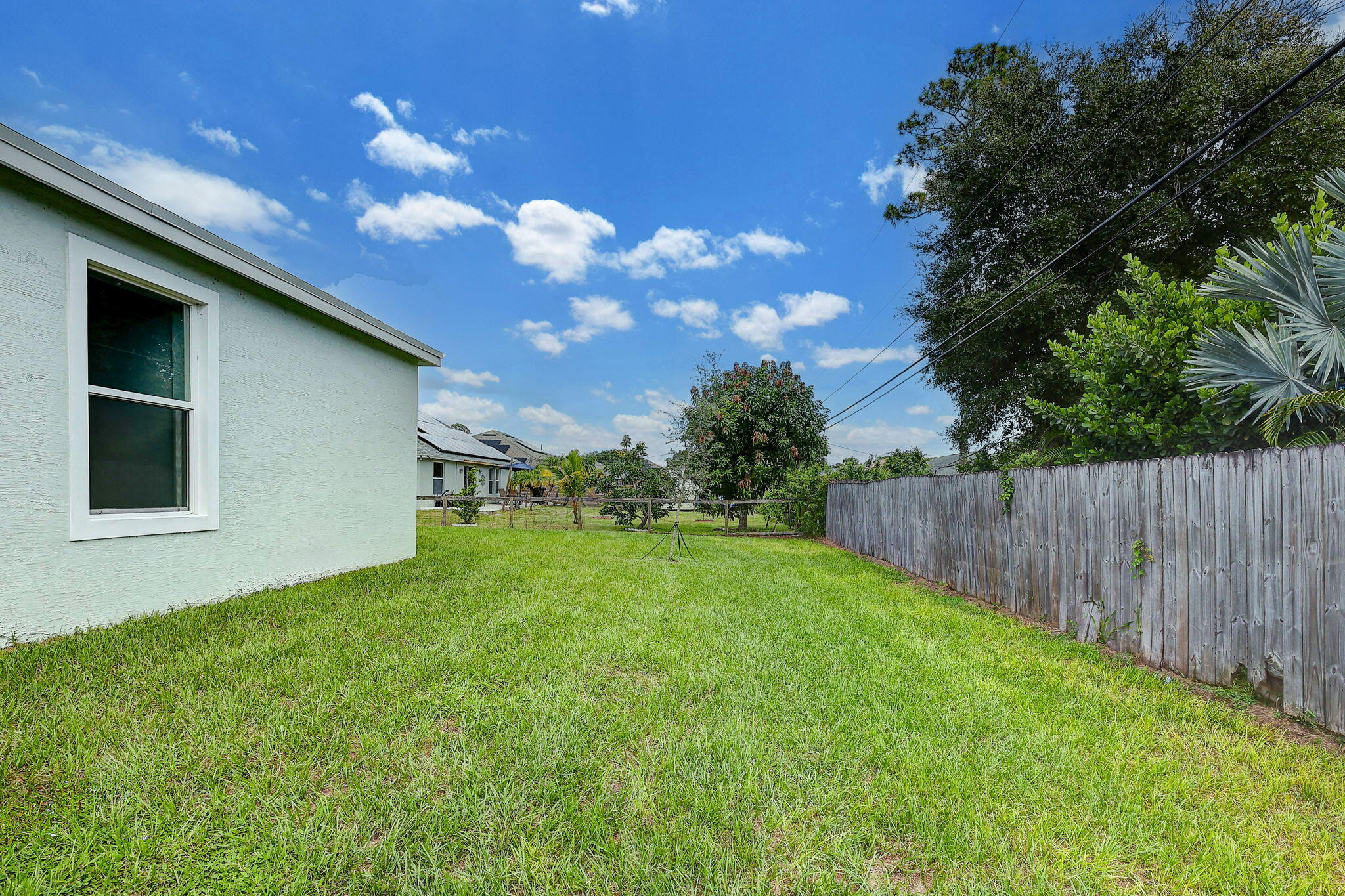 1749 Southwest California Boulevard Port St. Lucie, FL 34953 - Photo 26 of 33 a view of backyard with a garden