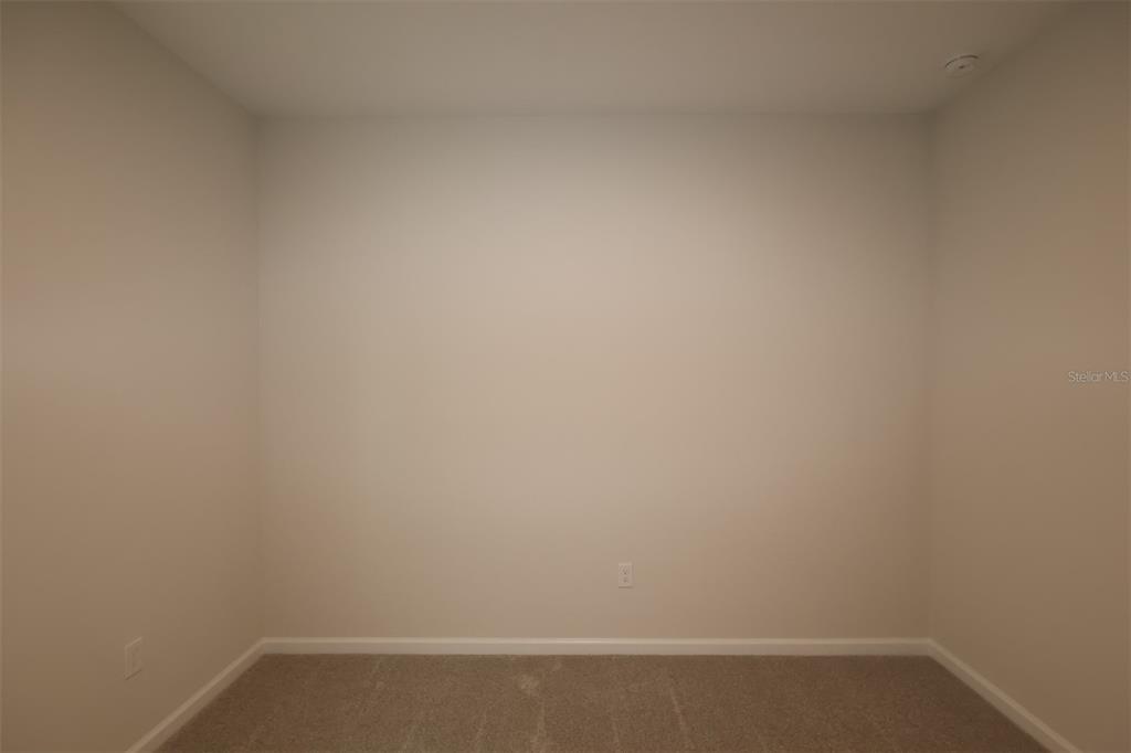 5303 High Line Drive St. Cloud, FL 34771 - Photo 16 of 22 view of small space with empty racks