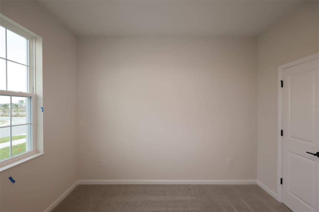 5303 High Line Drive St. Cloud, FL 34771 - Photo 18 of 22 an empty room with a window