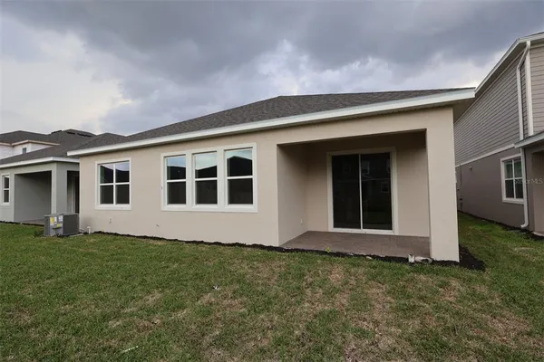 a front view of house with yard