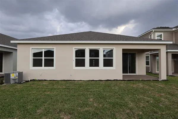 a front view of house with yard