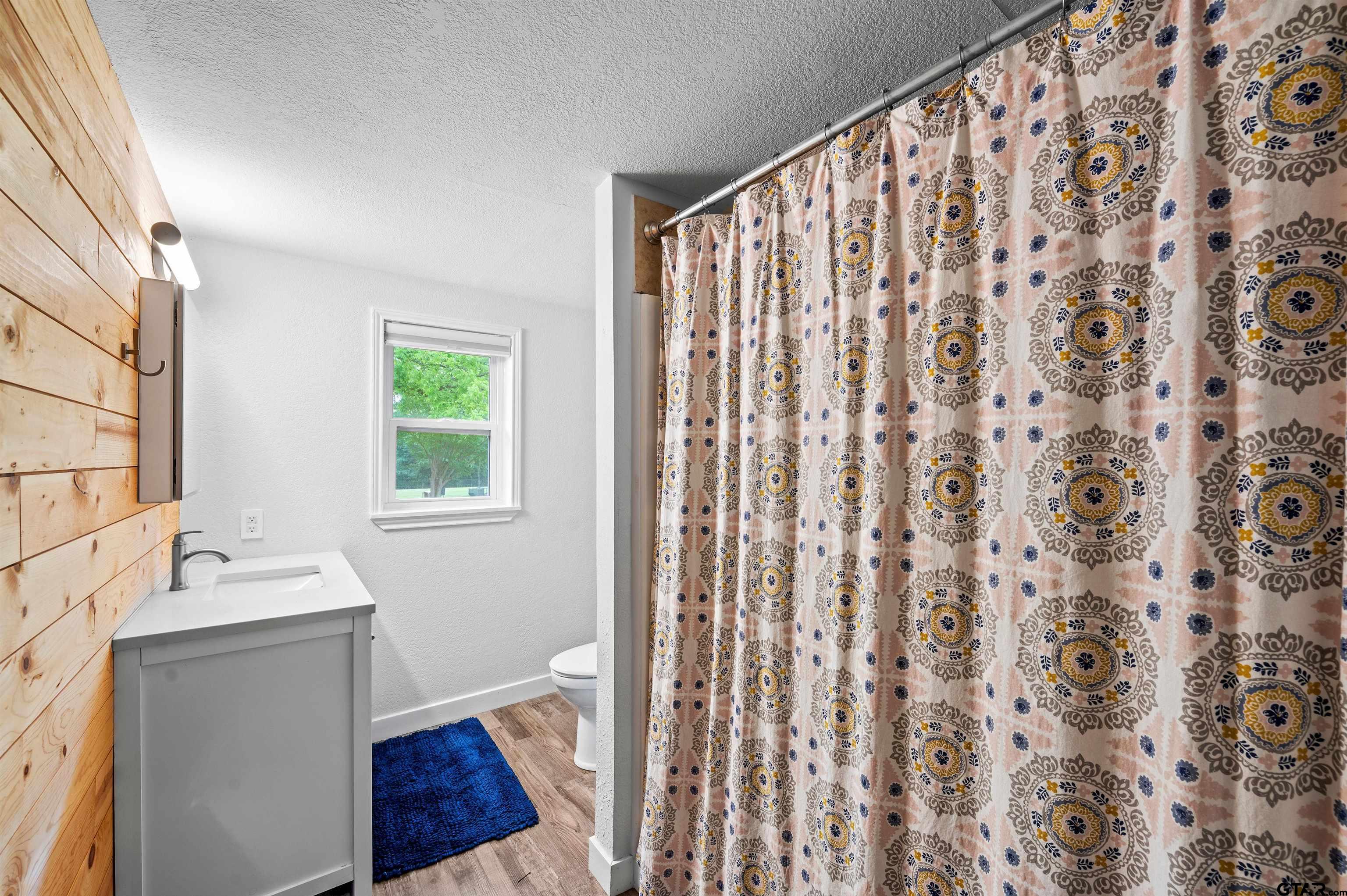536 County Road 2373 Alba, TX 75410 - Photo 12 of 19 a bedroom with a bed and a window