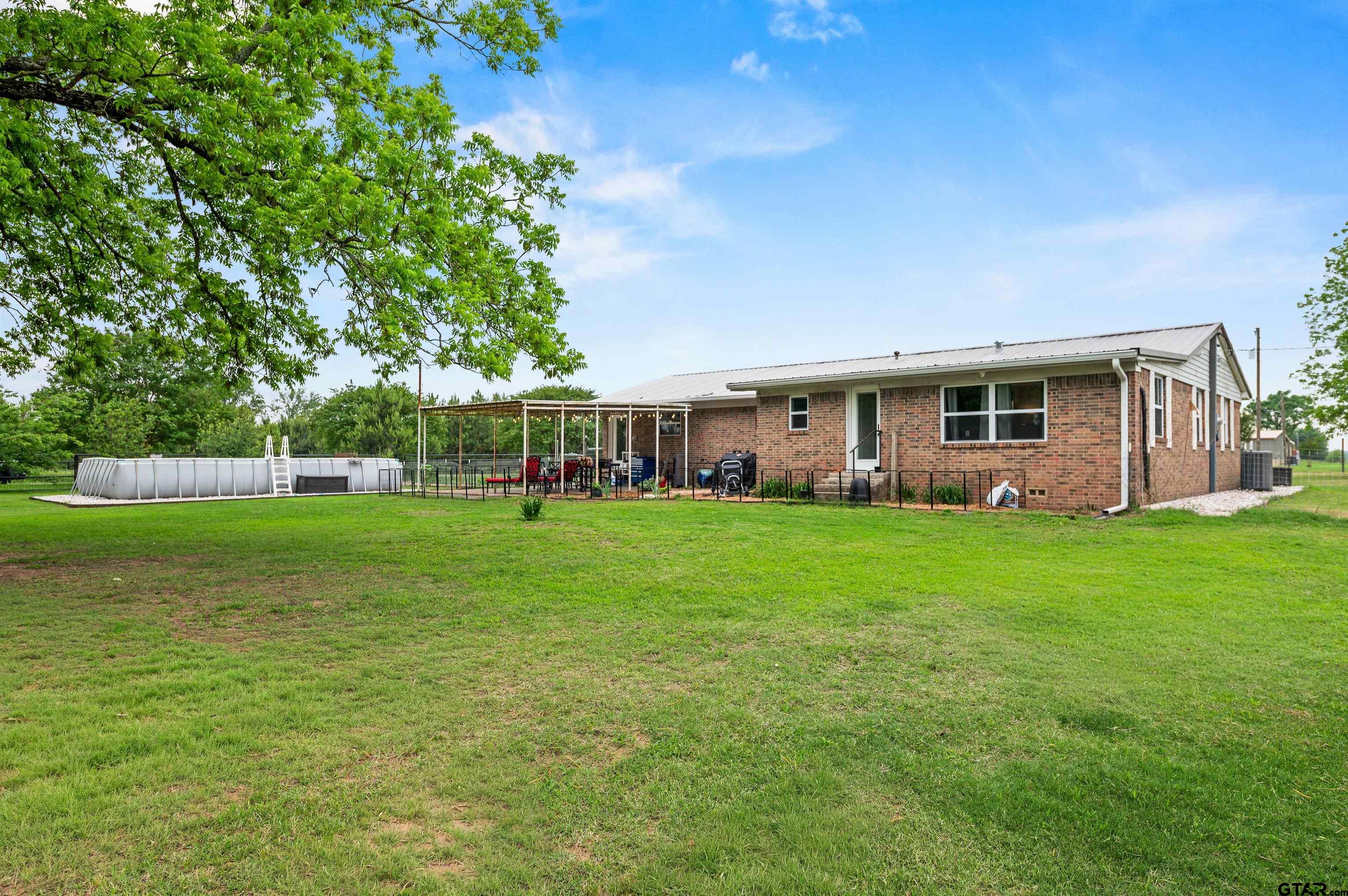 536 County Road 2373 Alba, TX 75410 - Photo 19 of 19 a front view of house with yard and green space