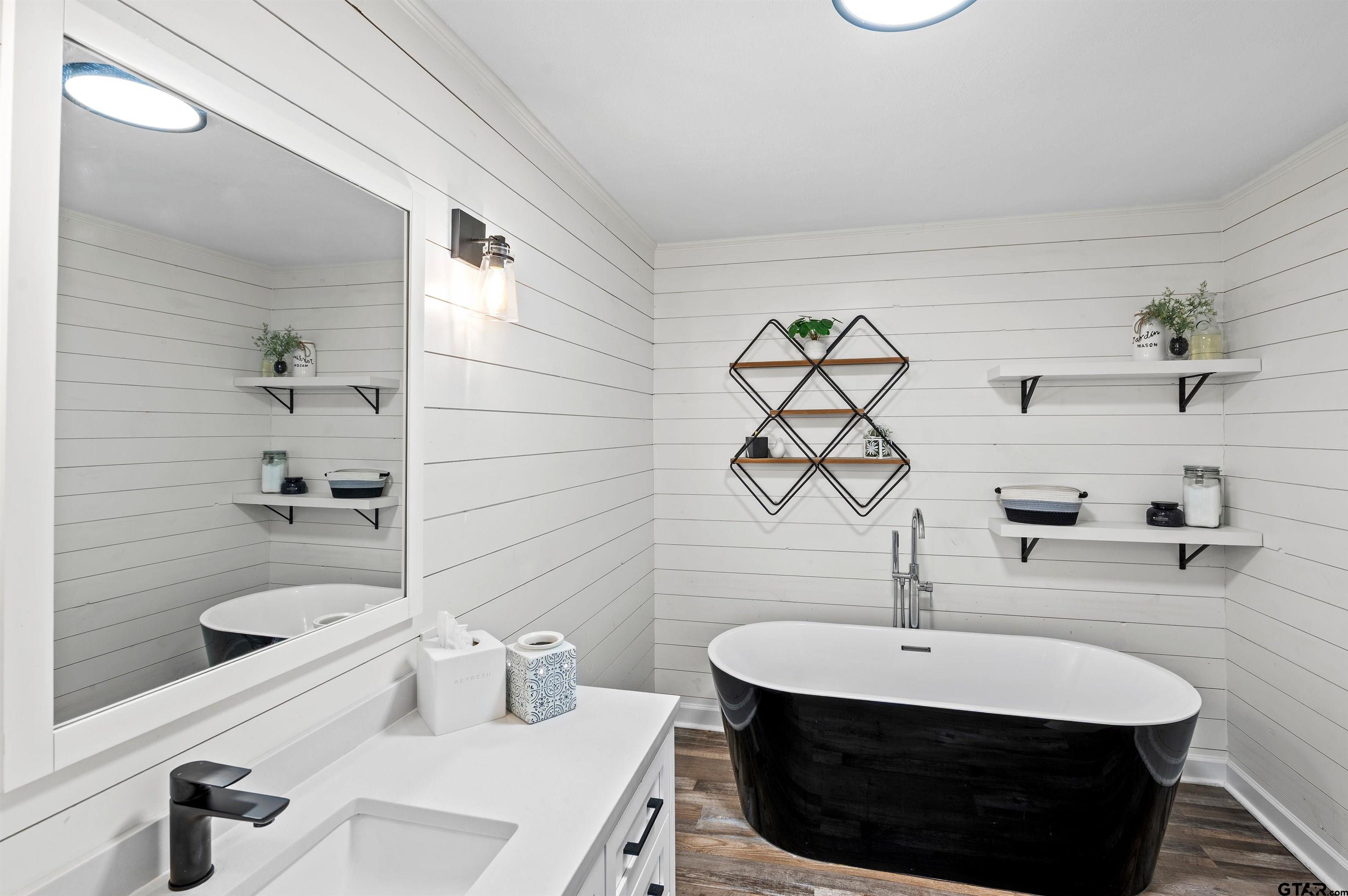 536 County Road 2373 Alba, TX 75410 - Photo 9 of 19 a bathroom with a sink and a mirror