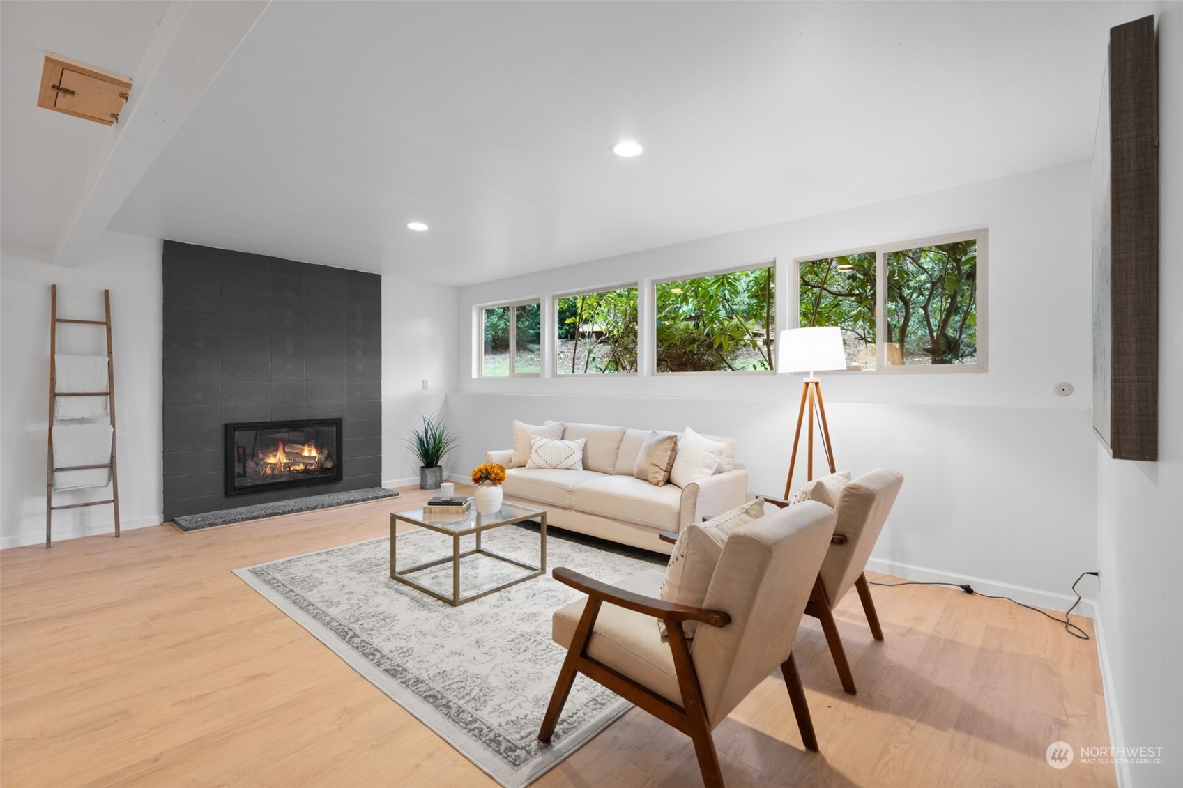 505 Cypress Road Bellingham, WA 98225 - Photo 21 of 37 a living room with furniture and a fireplace