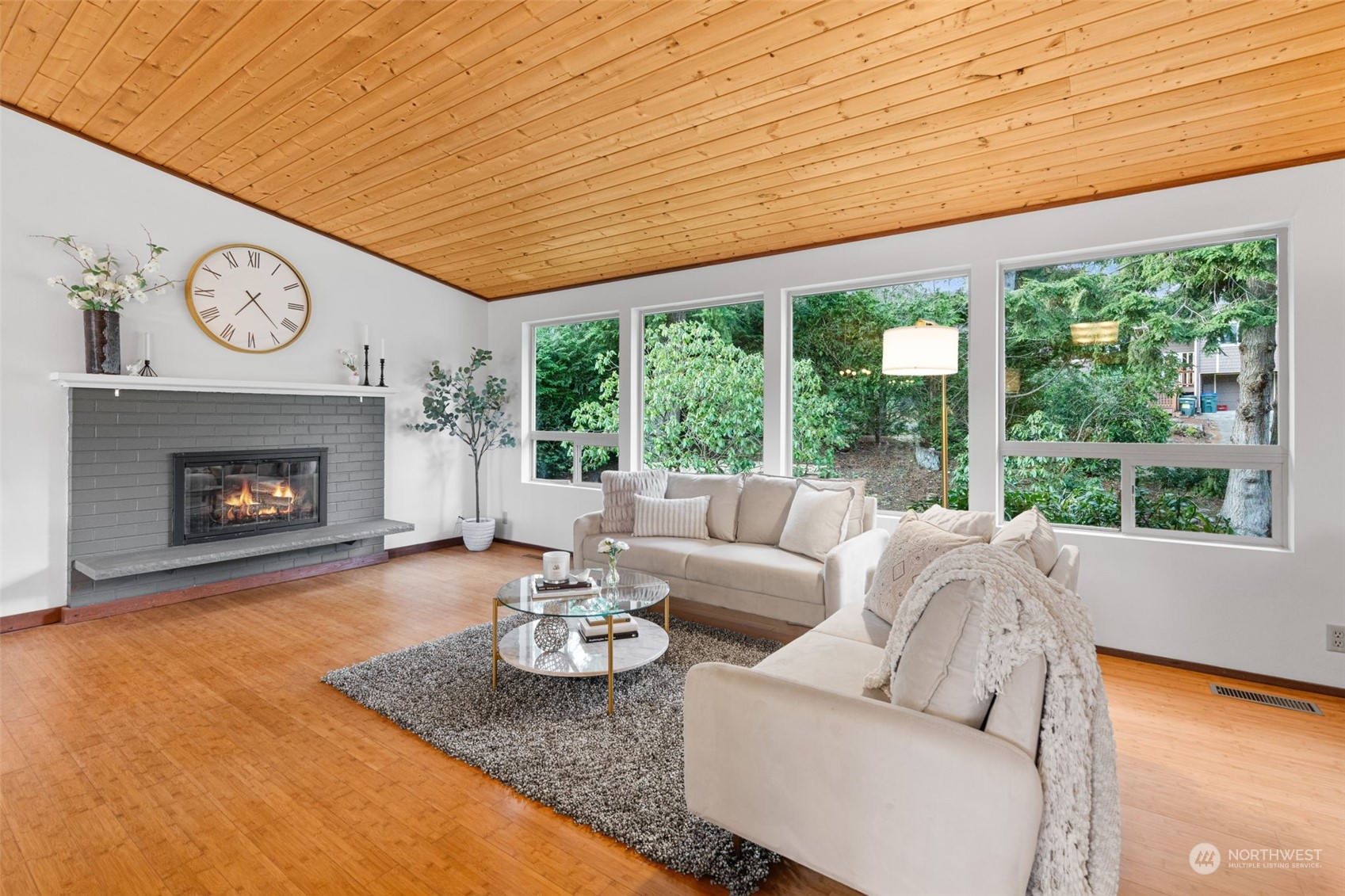 505 Cypress Road Bellingham, WA 98225 - Photo 6 of 37 a living room with furniture and a fireplace