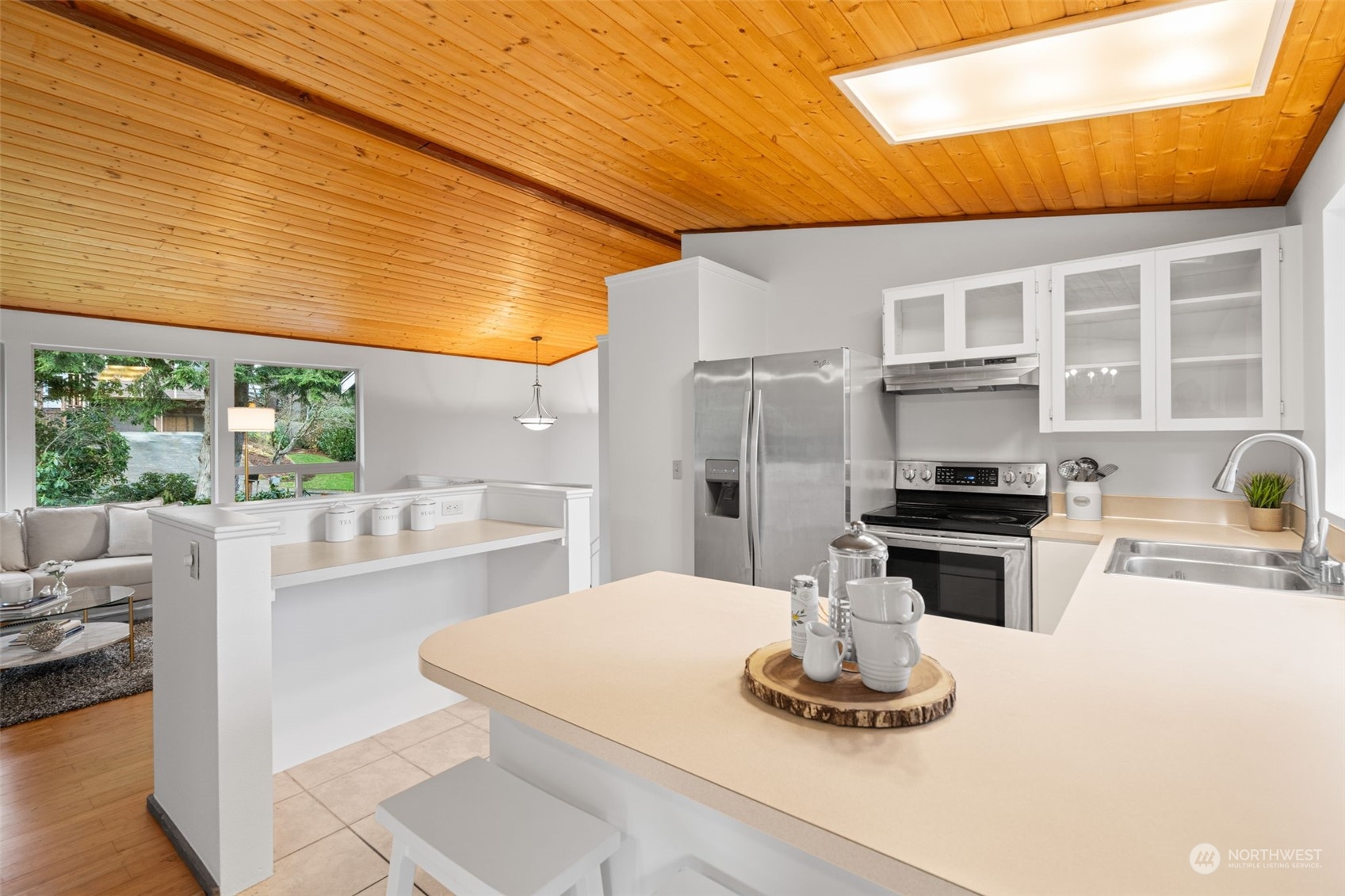 505 Cypress Road Bellingham, WA 98225 - Photo 10 of 37 a kitchen with a stove a refrigerator and a view of living room