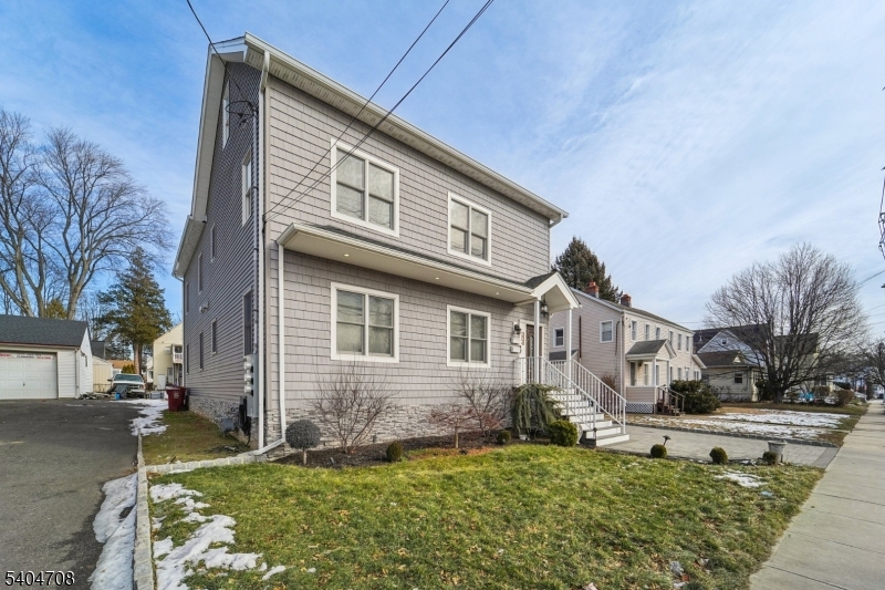 204 Harrison Street Nutley, NJ 07110 - Photo 17 of 23 a view of a house with a yard