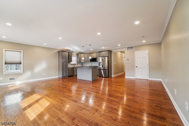 204 Harrison Street Nutley, NJ 07110 - Photo 4 of 23 a view of kitchen with refrigerator and window