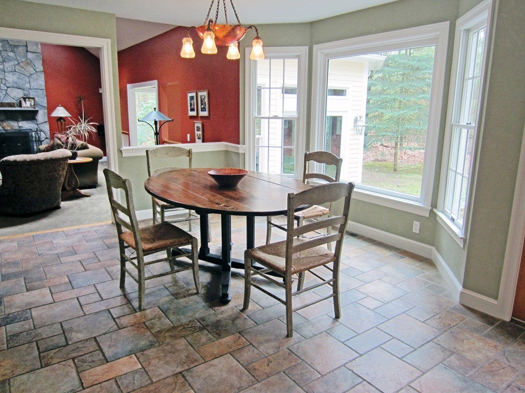 26 Williams Road Wayland, MA 01778 - Photo 8 of 24 a view of a dining room with furniture and a large window