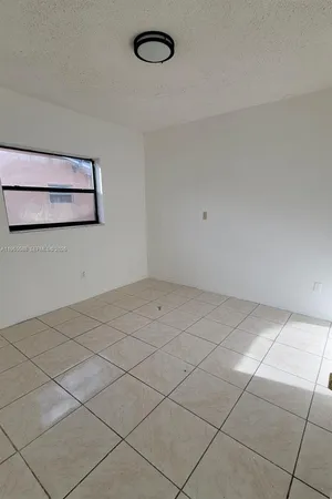 a bathroom with a sink a toilet and a bathtub