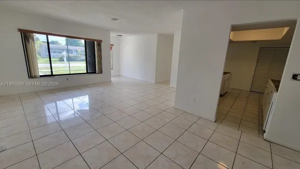 an empty room with windows