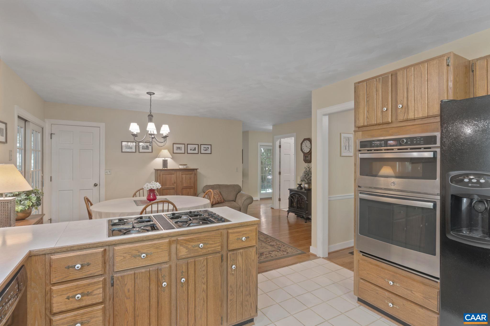 2 Whippoorwill Lane Palmyra, VA 22963 - Photo 10 of 36 a kitchen with stainless steel appliances granite countertop a refrigerator and a sink