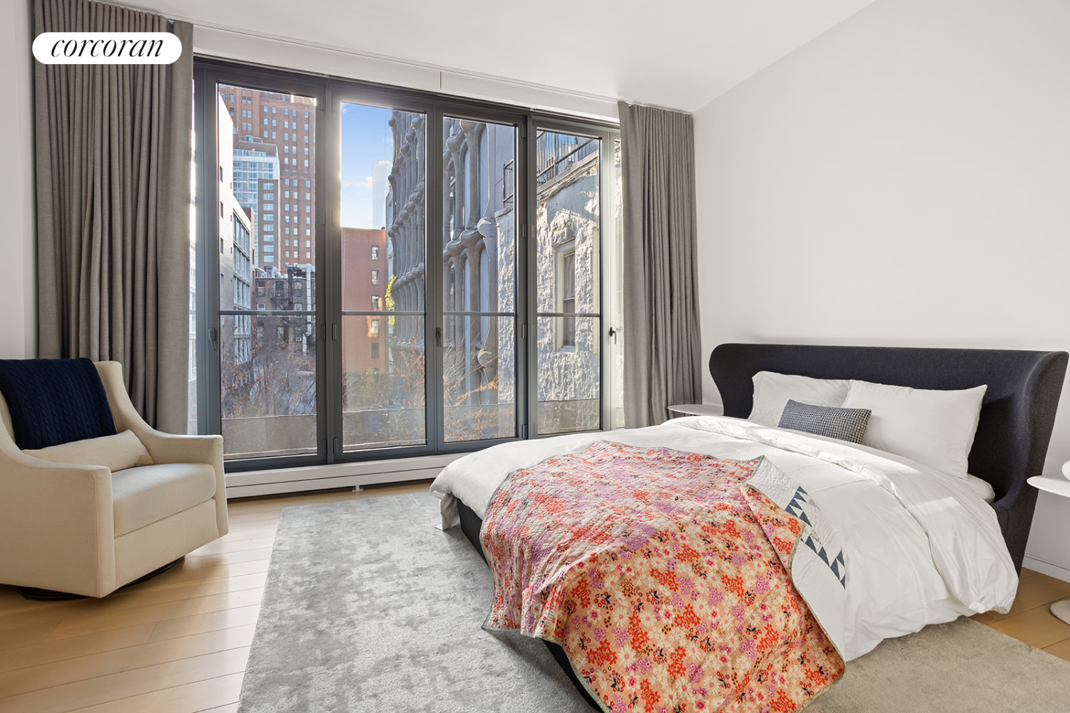 27 Wooster Street, Unit 4A Manhattan, NY 10013 - Photo 13 of 16 a bedroom with a bed and a couch