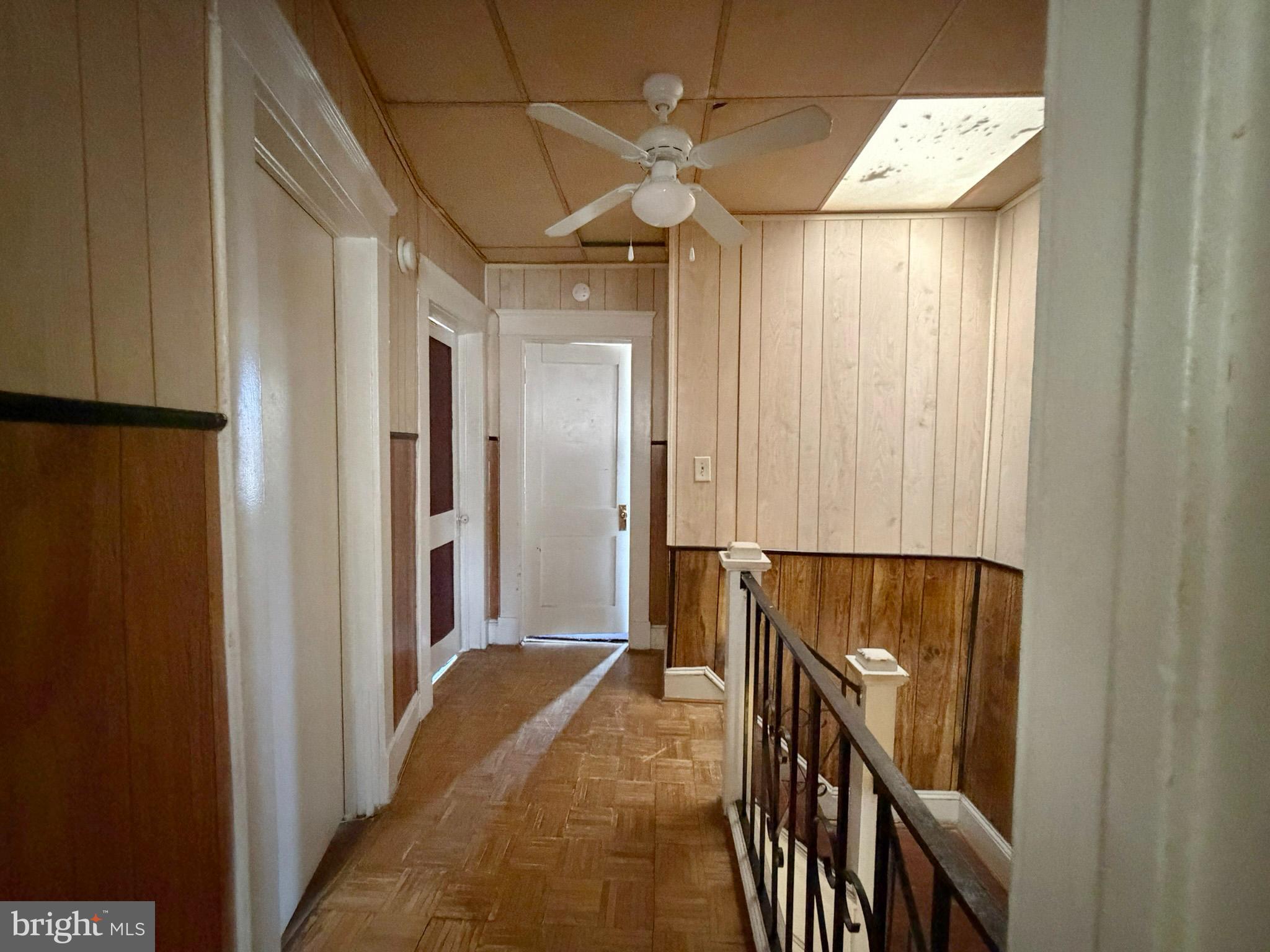 2802 Brighton Street Baltimore, MD 21216 - Photo 15 of 38 a view of hallway with chandelier