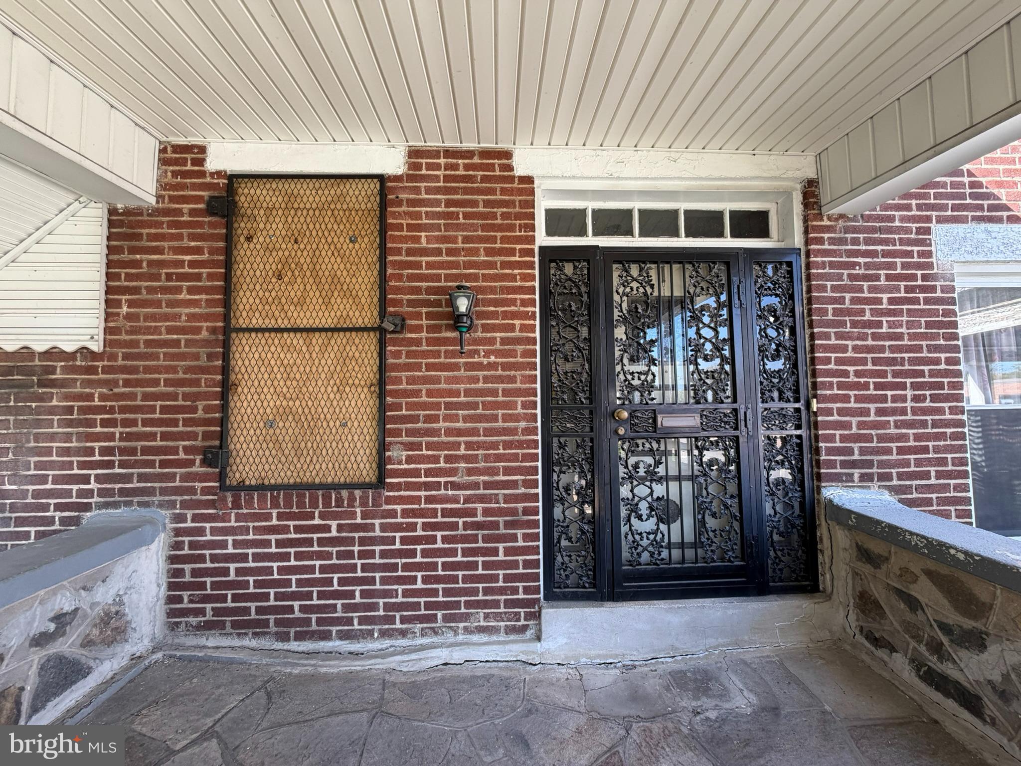2802 Brighton Street Baltimore, MD 21216 - Photo 2 of 38 a view of front door of house with an space