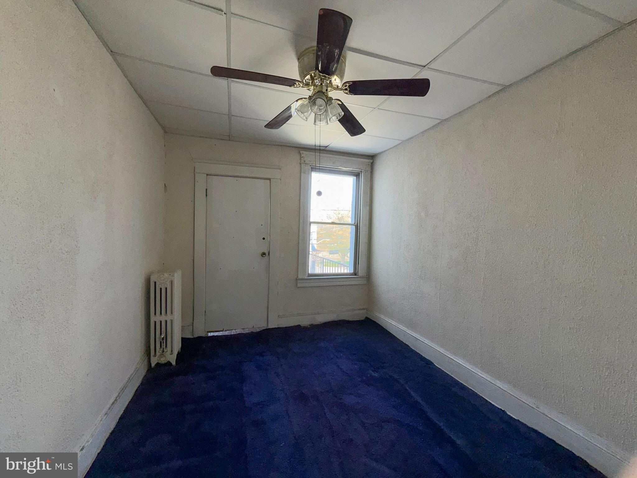 2802 Brighton Street Baltimore, MD 21216 - Photo 23 of 38 a view of entryway and hall with wooden floor