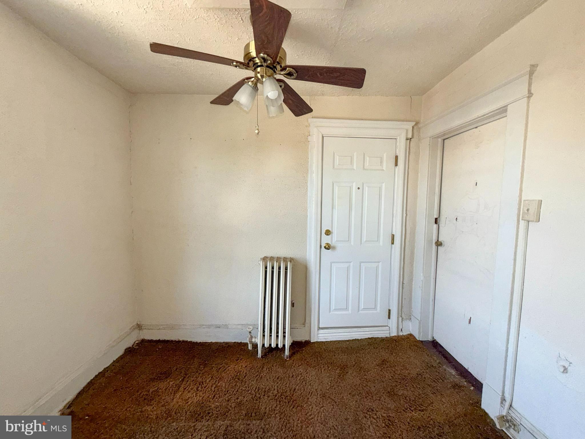 2802 Brighton Street Baltimore, MD 21216 - Photo 24 of 38 wooden floor in an empty room