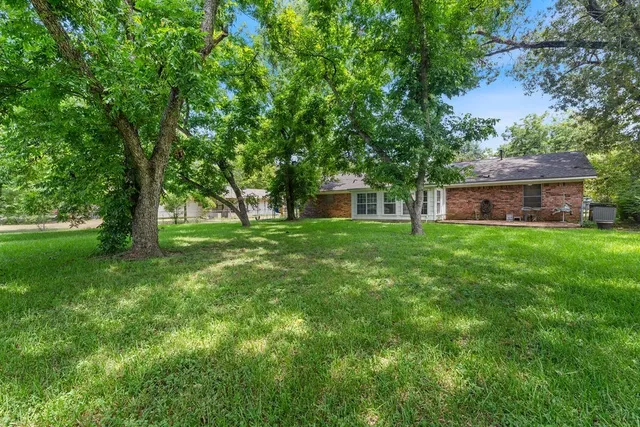 a house view with a garden space