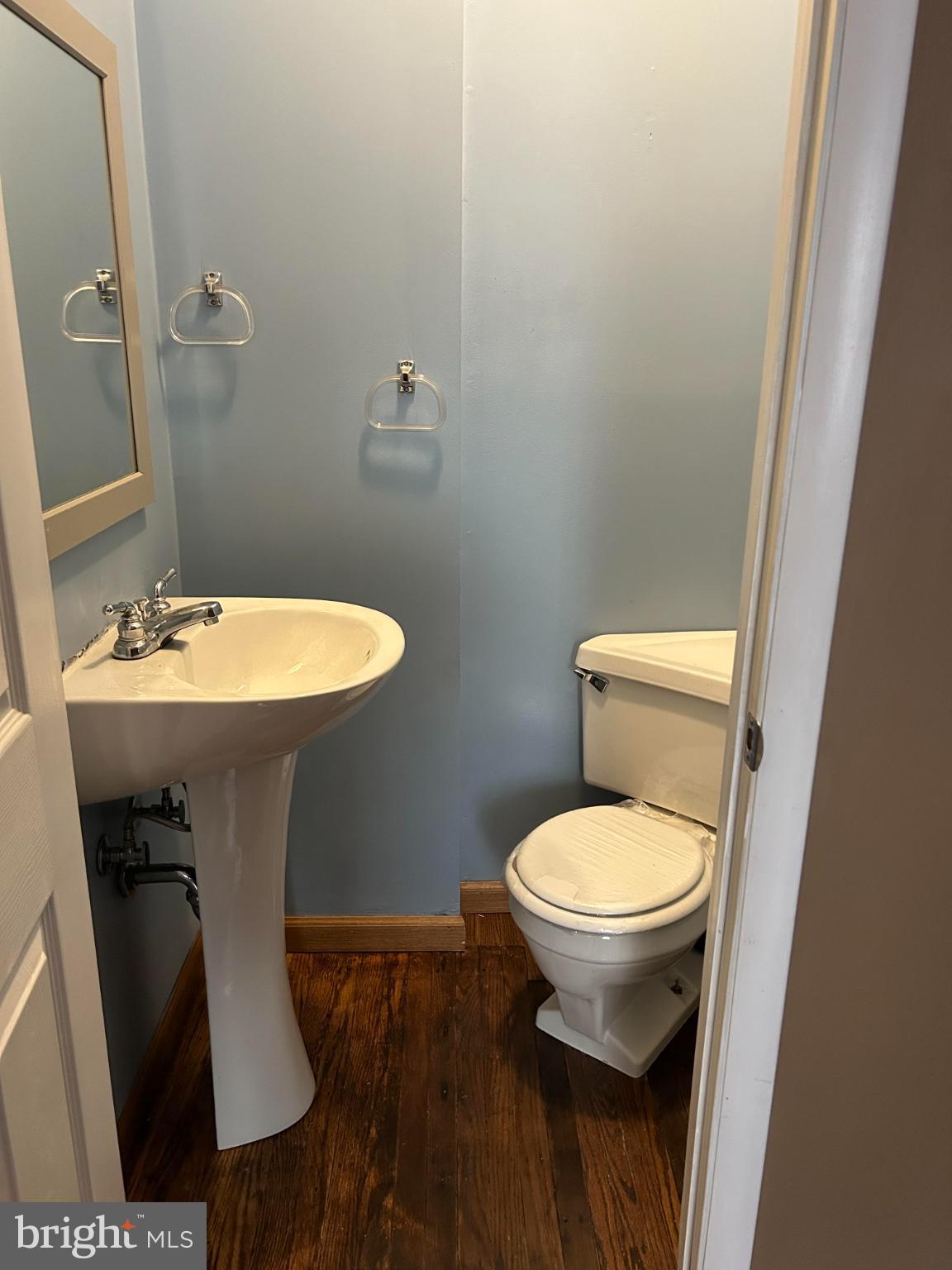 1466 Bluejay Road Abington, PA 19001 - Photo 12 of 20 a bathroom with a toilet sink and mirror