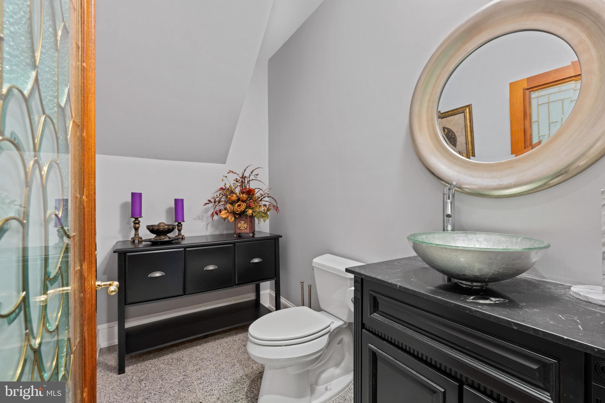83 Maple Avenue Mays Landing, NJ 08330 - Photo 29 of 46 a bathroom with a sink a toilet and a mirror