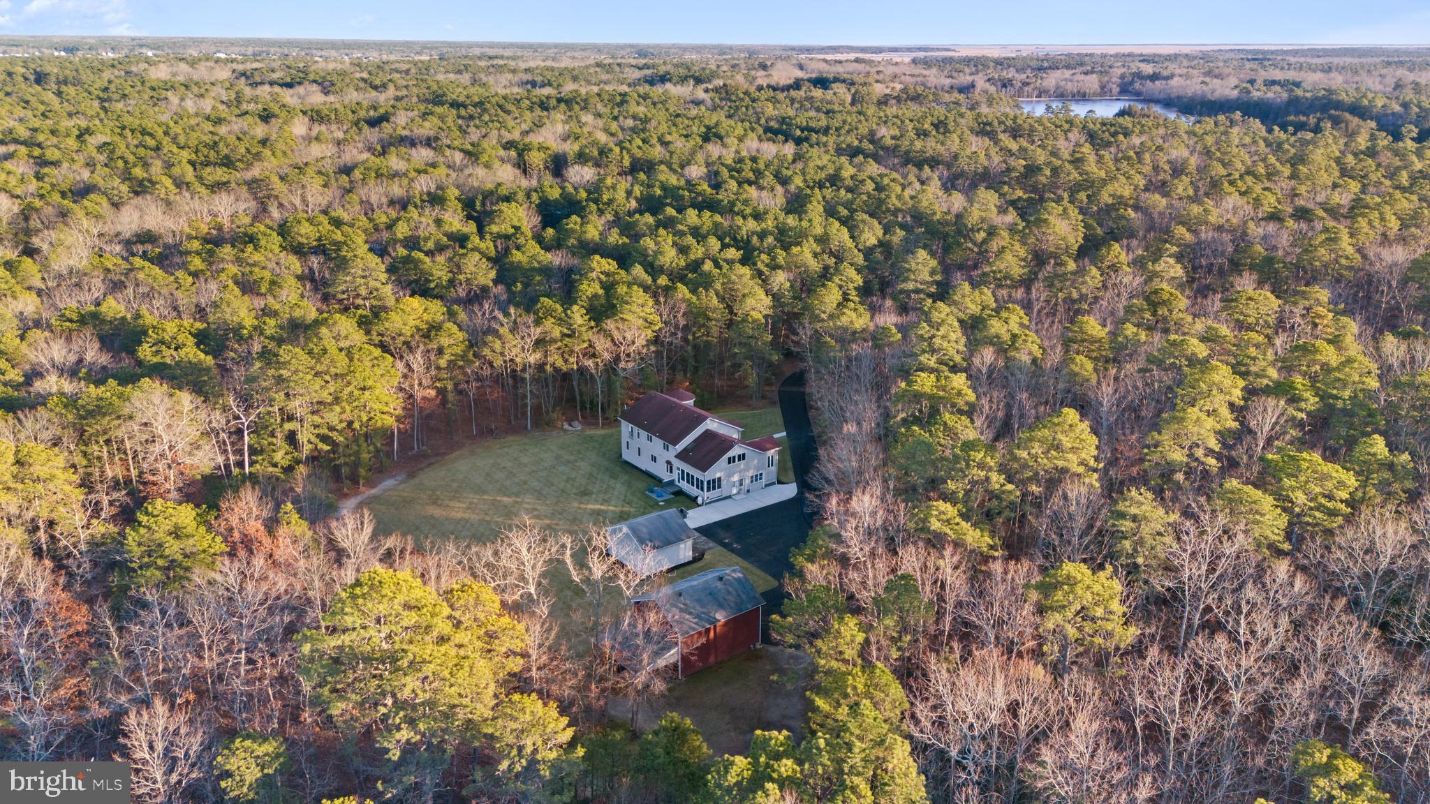 83 Maple Avenue Mays Landing, NJ 08330 - Photo 9 of 46 a view of a city with lush green forest