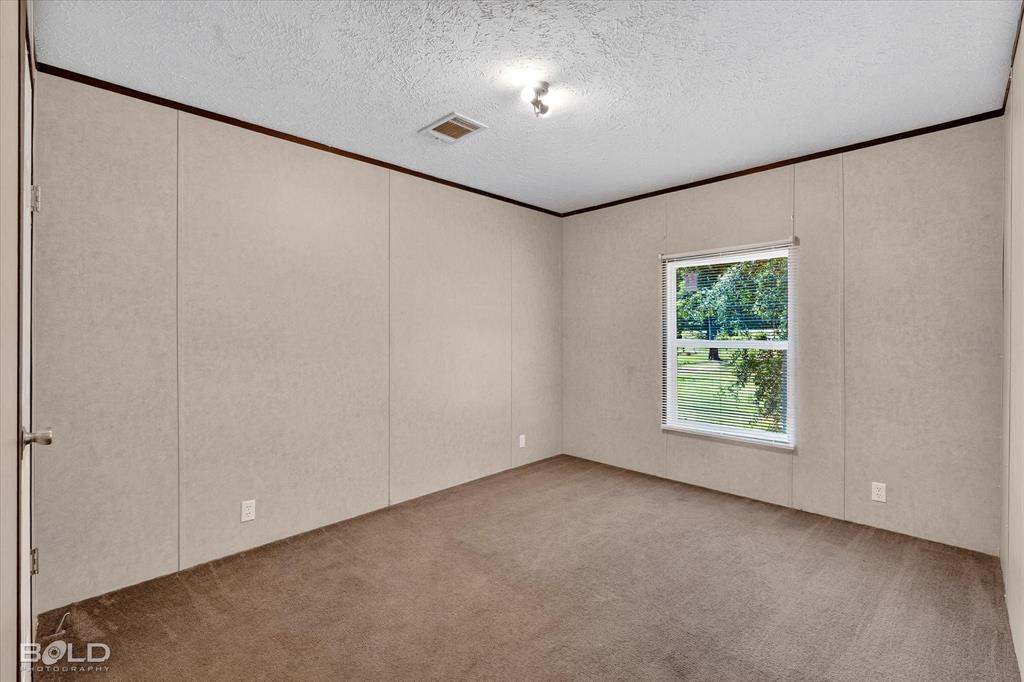 2153 Highway 2 Plain Dealing, LA 71064 - Photo 37 of 39 an empty room with windows