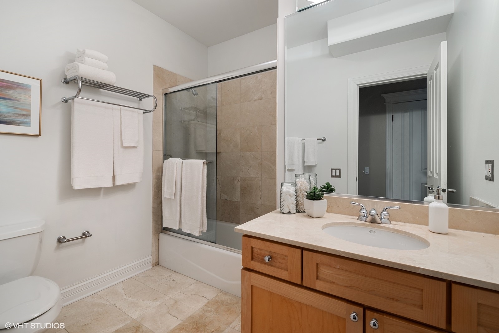 1503 North Mohawk Street, Unit 1E Chicago, IL 60610 - Photo 20 of 25 a bathroom with a granite countertop sink toilet and shower