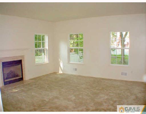 84 Harding Avenue Edison, NJ 08820 - Photo 7 of 8 a view of an empty room with a window