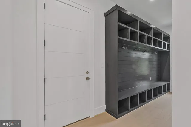 a view of an empty room with windows