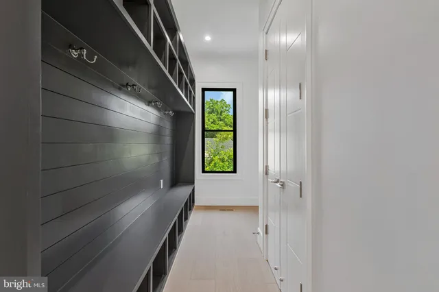 a bathroom with a shower sink and mirror