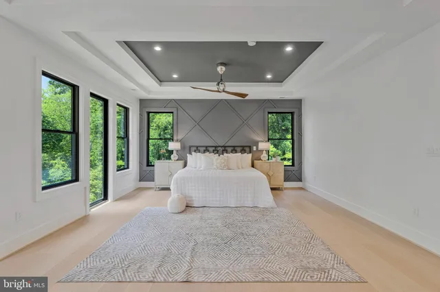 a view of kitchen with wooden floor and windows
