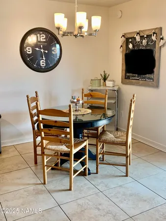 a view of a workspace with furniture