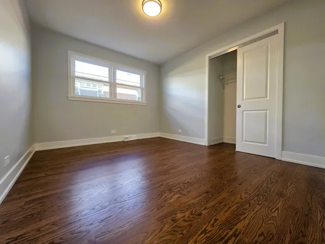 a view of a livingroom with furniture and a table